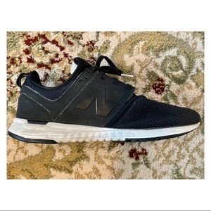 Black New Balance sneakers